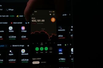 A person holding a cell phone in their hand