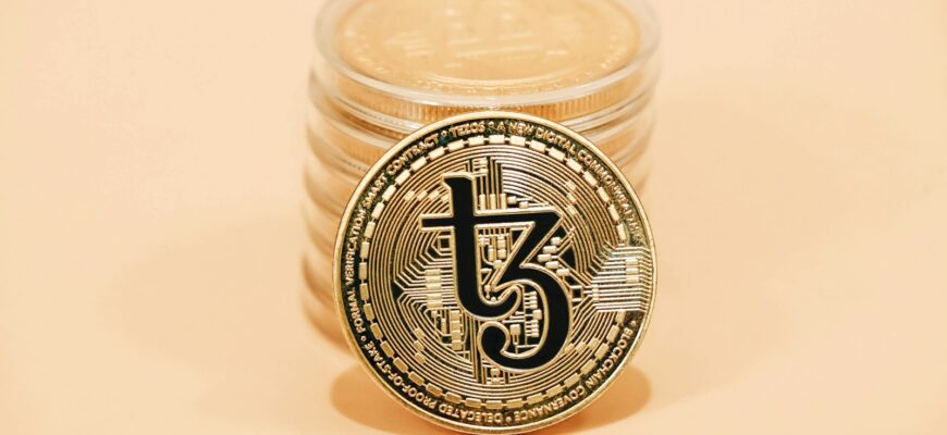 a stack of coins sitting on top of a table