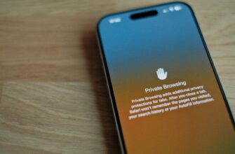 A cell phone sitting on top of a wooden table