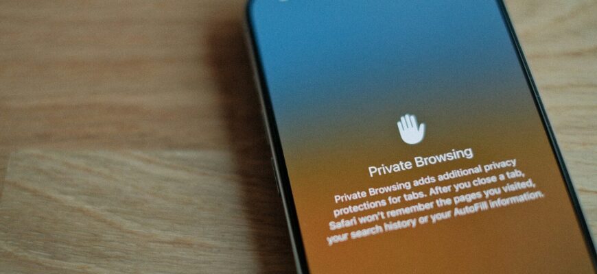 A cell phone sitting on top of a wooden table