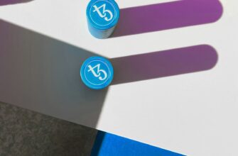 a couple of blue and purple markers sitting on top of a table