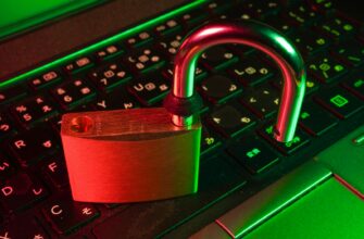 red padlock on black computer keyboard