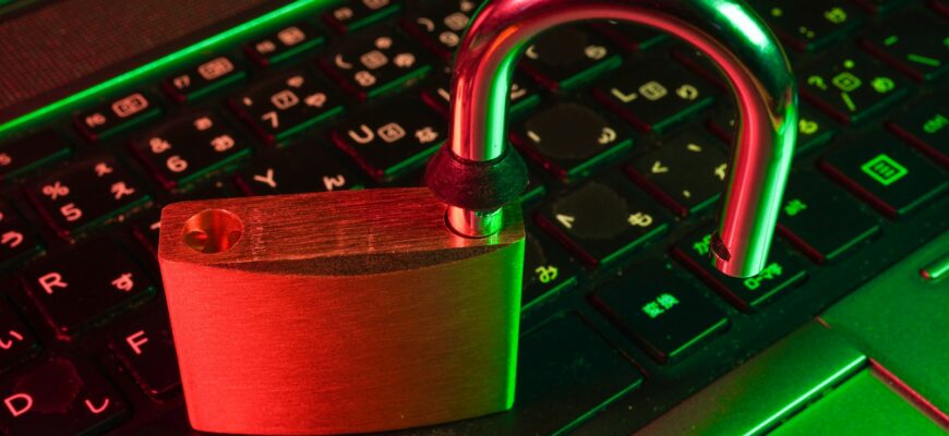 red padlock on black computer keyboard